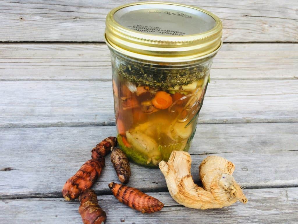 Fire Cider with turmeric and ginger jar