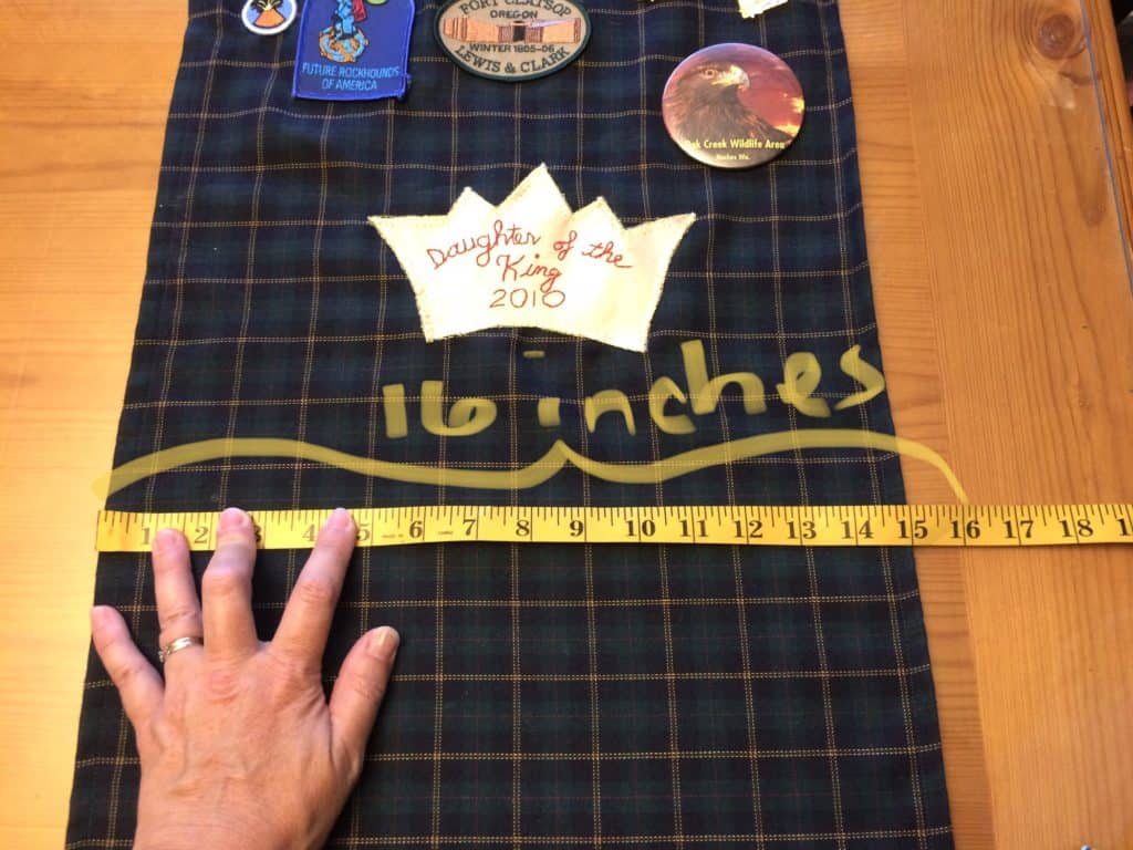 Measuring banner width with tape measure