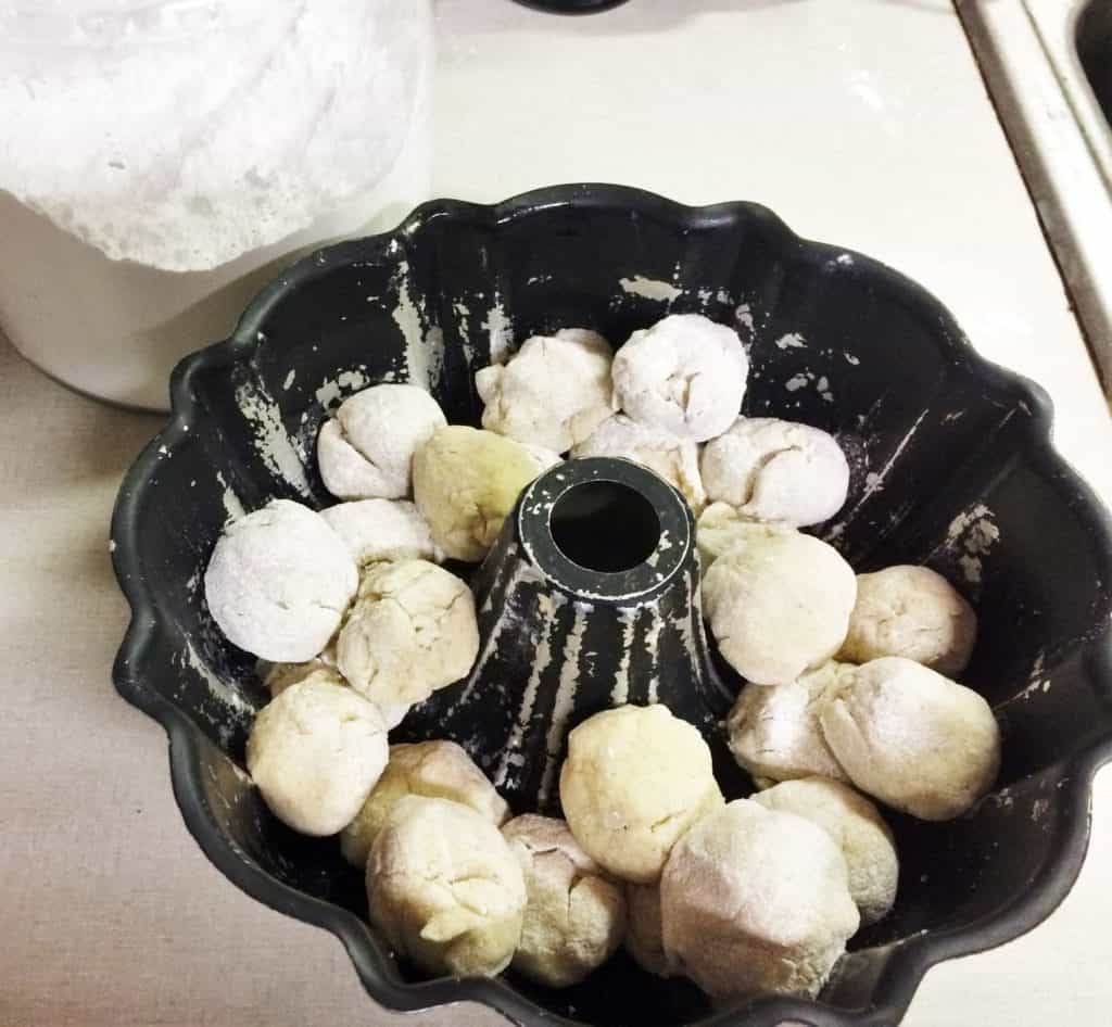 Filling bundt pan with dough balls