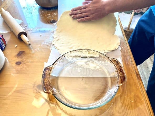 transferring pie crust to pie plate with wax paper