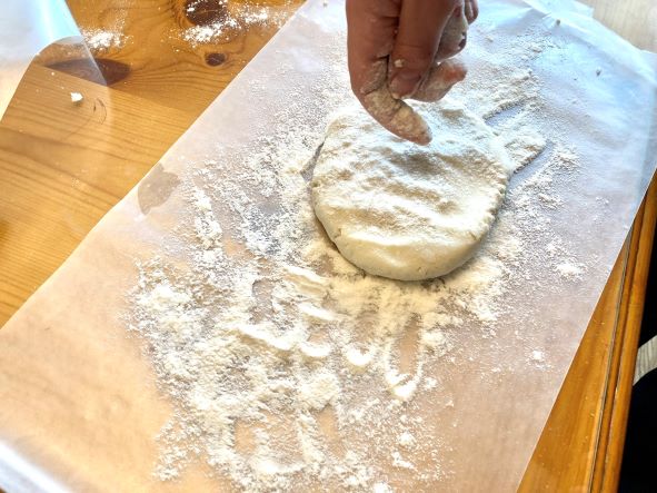 gluten free pie dough dusting with flour