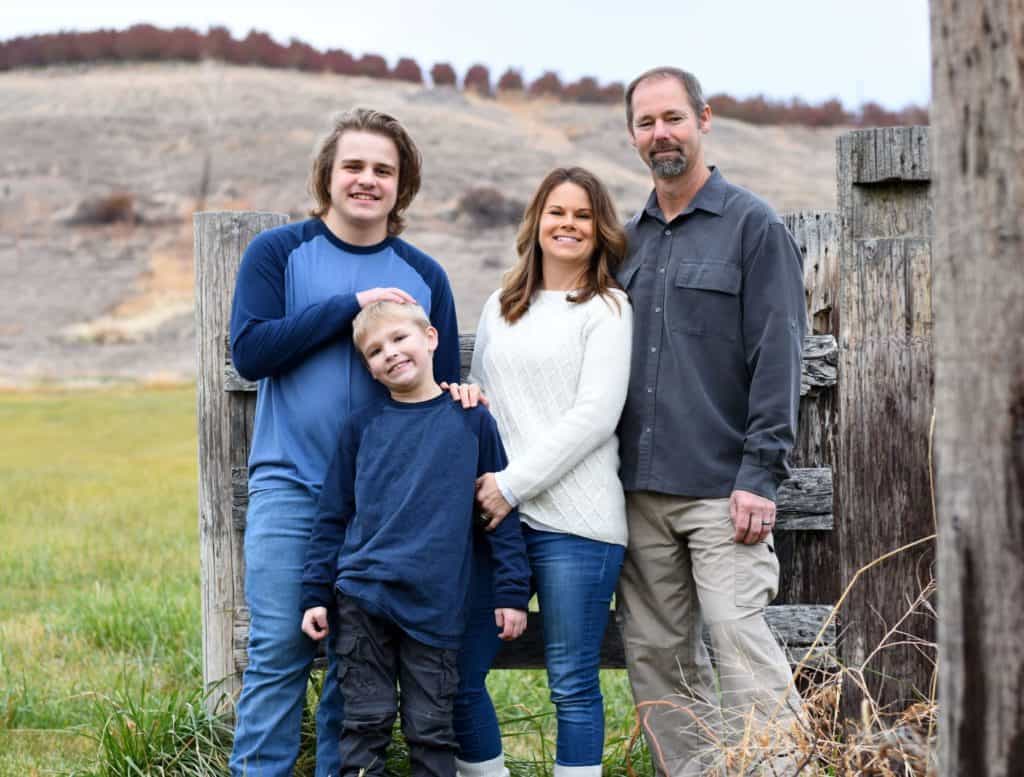 Family picture with Renee, husband, and two sons