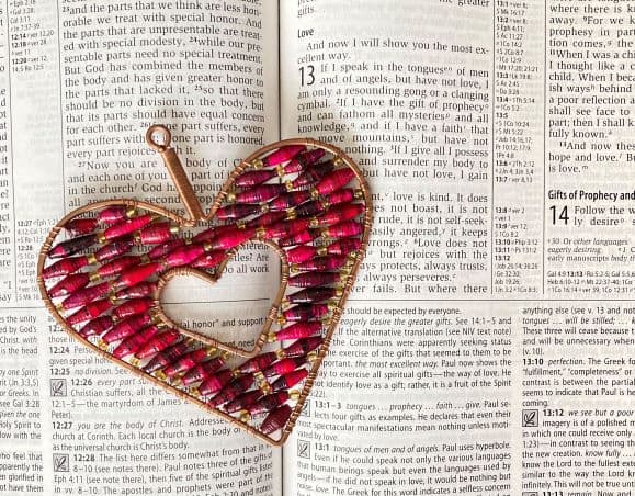 Heart ornament sitting on Bible