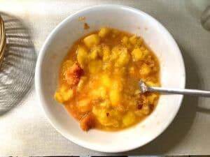 Mashed up peach fruit