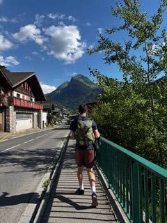 person walking on sidewalk