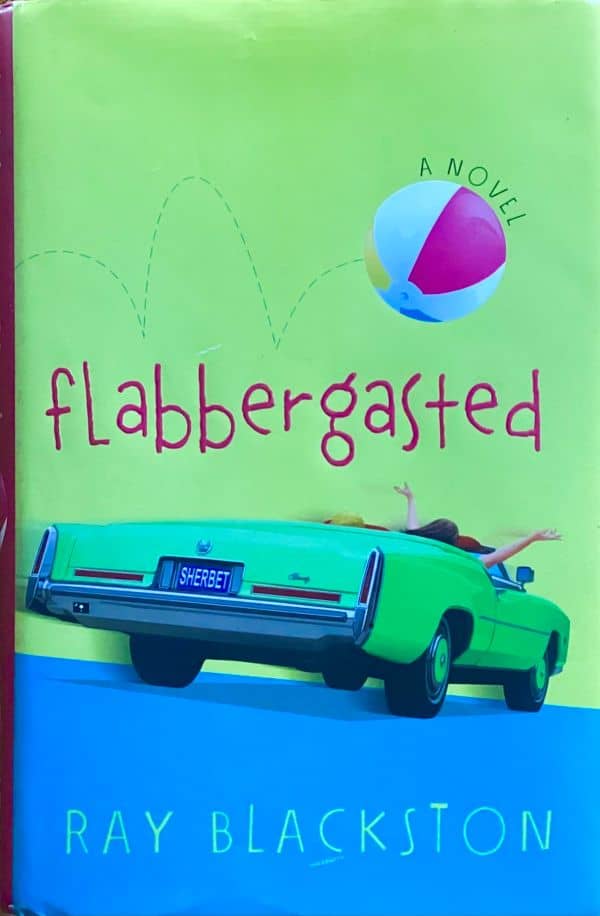 green Cadillac and beach ball