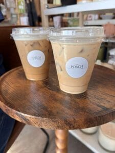 two coffee drinks on a table